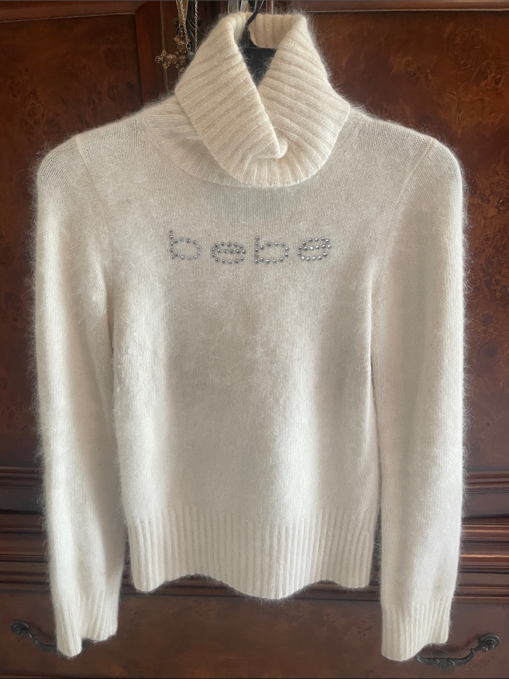 bebe Cream Rhinestone Logo Turtleneck Sweater